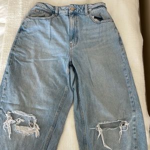 Light blue ripped denim jeans